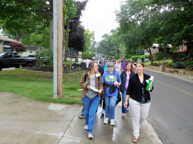 Shari Wagner, Indiana poet laureate, and Megan McClellan, executive trails director for Syracuse-Wawasee Trails, lead a group of more than 20 on a guided five-mile walk with stops for reading poetry that evoked past and present.