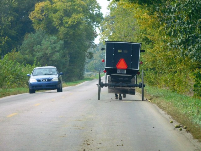 Traditional meets modern on a country road.