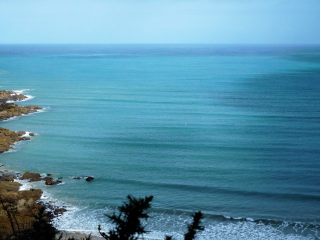 Green, blue sea aka Carbis Bay leading to the Irish Sea.